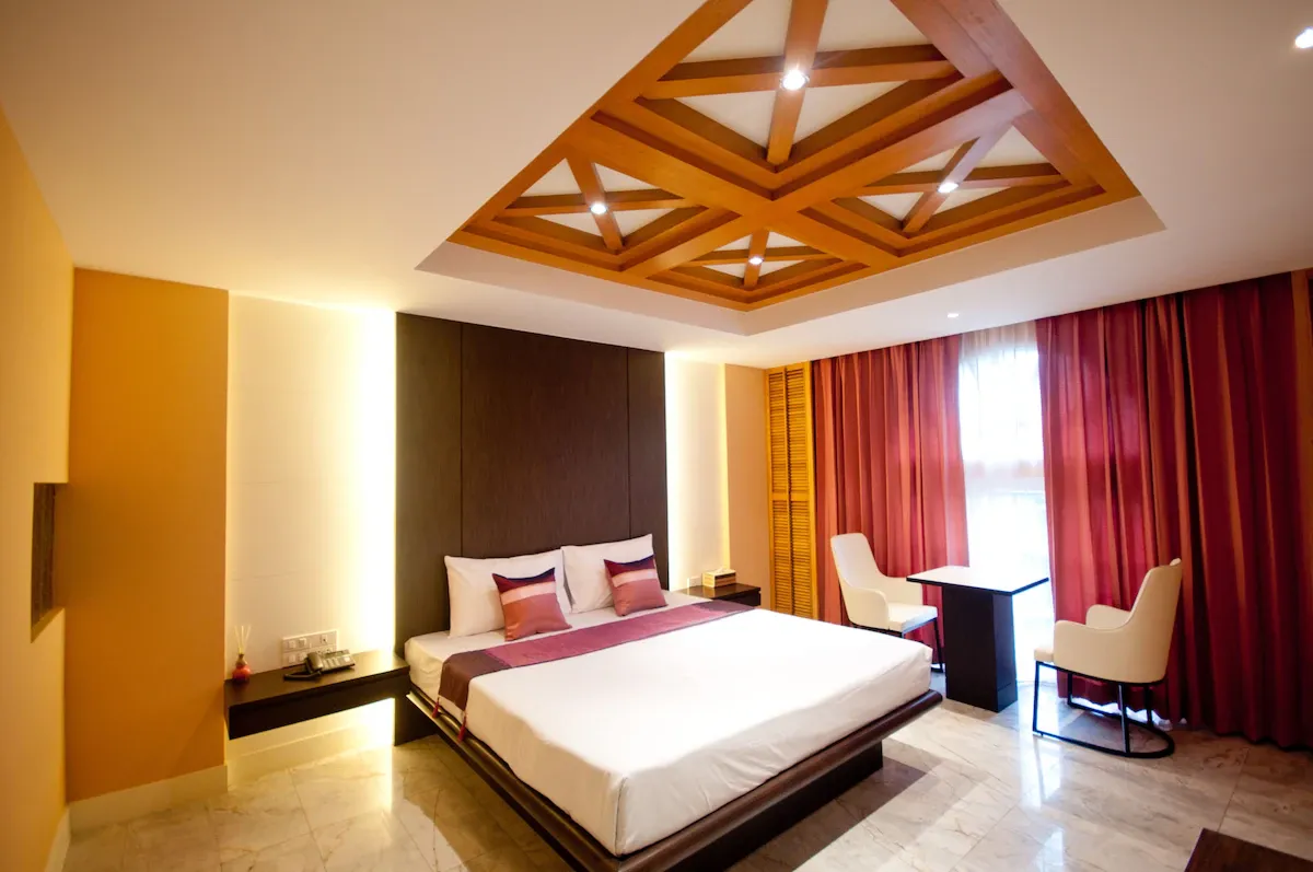 Luxury VIP room interior showing seating area ภายในห้อง VIP ตกแต่งหรู พร้อมมุมนั่งเล่นส่วนตัว