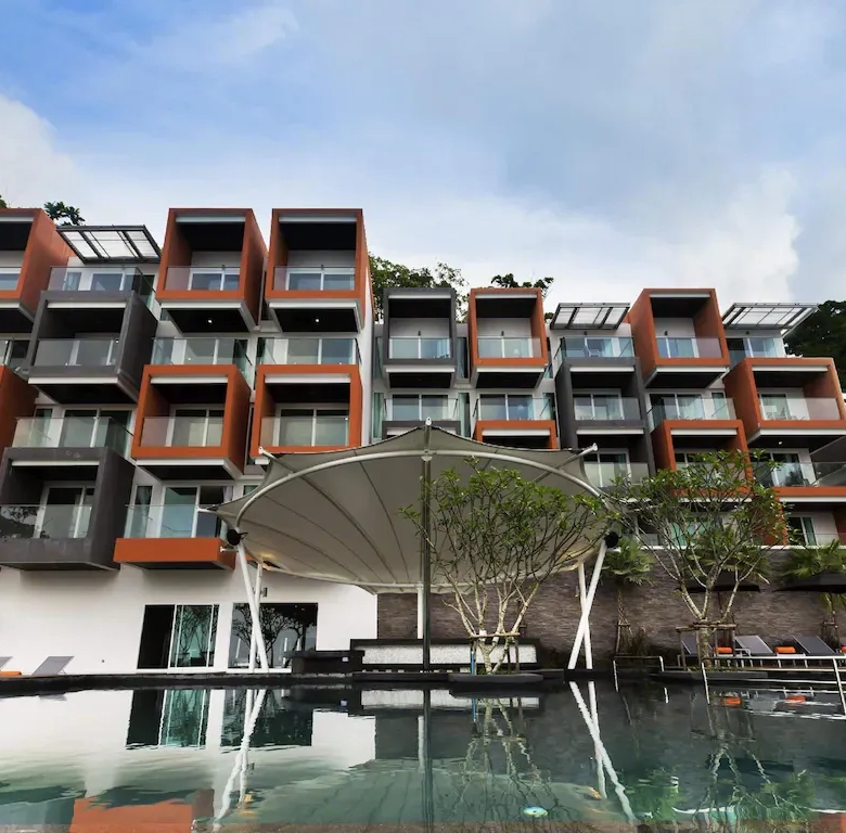 Luxury 4-Star Business Hotel for Sale on Silom Road Front exterior view of boutique hotel in South Pattaya, Thailand