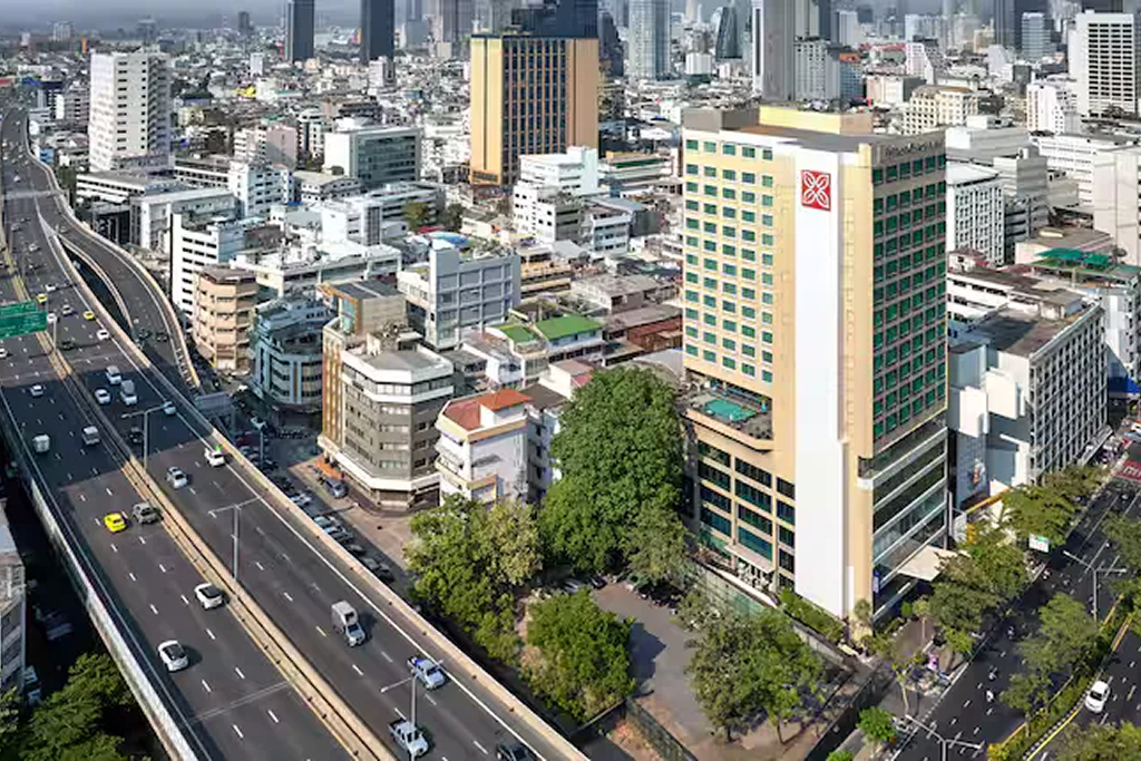 4-star business hotel for sale on Silom Road Bangkok Aerial night city skyline highlighting prime hotel investment location