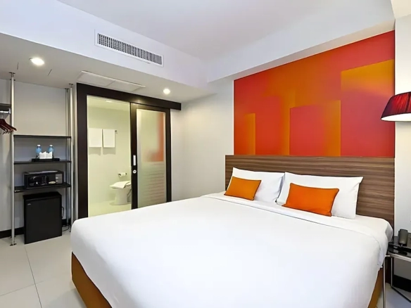 Bright hotel room interior with functional layout