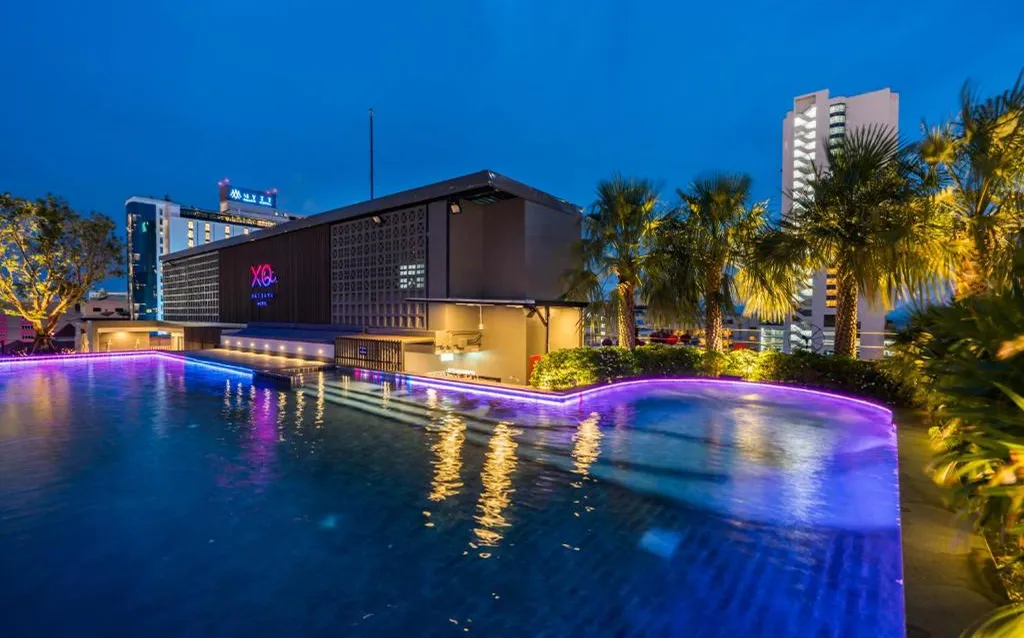 Guest room with pool view at night in North Pattaya