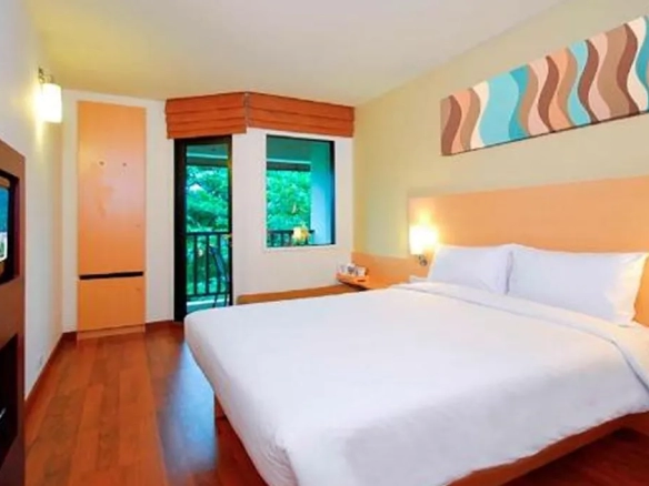 Wide angle shot of city hotel bedroom