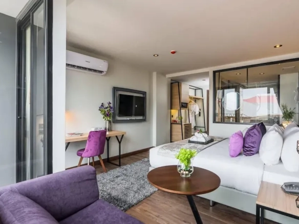 Corner guest room interior at boutique hotel North Pattaya