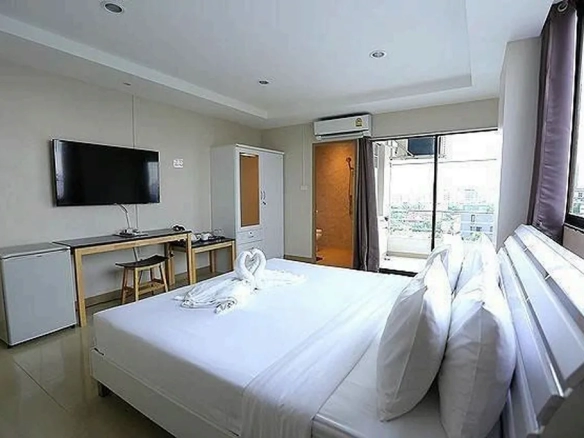 Hotel bedroom with premium bed setup