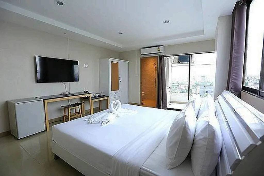 Hotel bedroom with premium bed setup