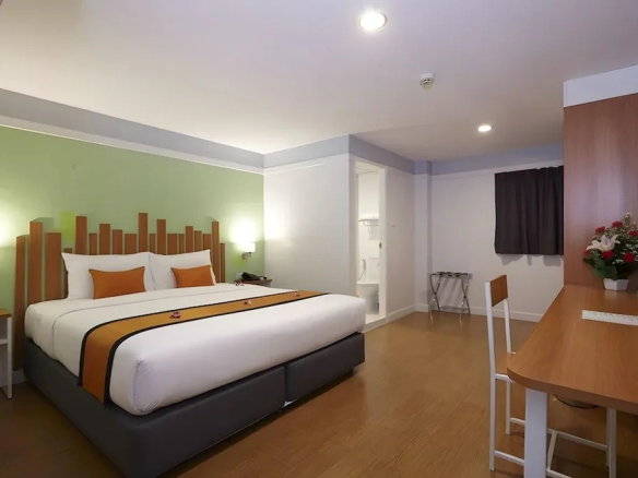 odern furnished hotel room with clean design