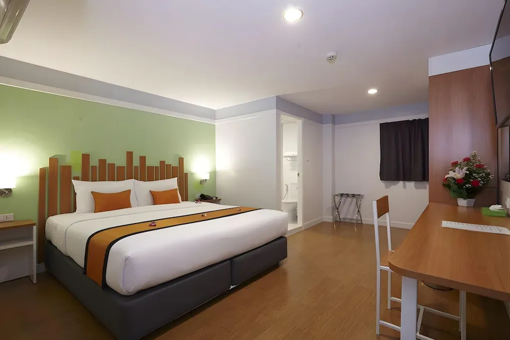 odern furnished hotel room with clean design