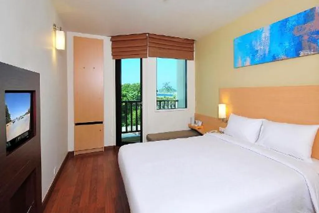 Bed and interior layout of city hotel room