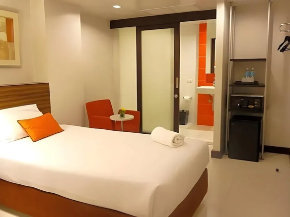 Hotel guest room with warm evening lighting