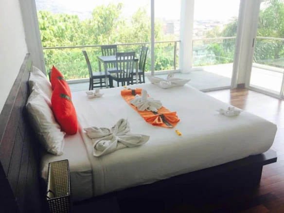 Bed decoration detail in guest room