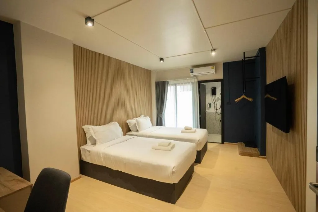 Wide-angle view of hotel guest room