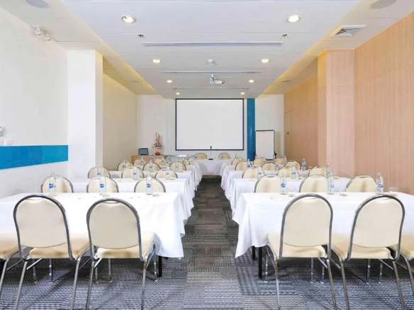 Rooftop swimming pool deck at city hotel