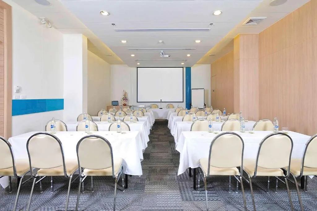 Rooftop swimming pool deck at city hotel