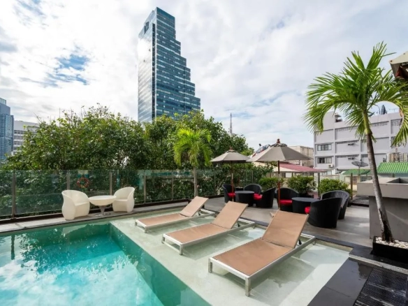 Poolside loungers enhancing resort-style appeal