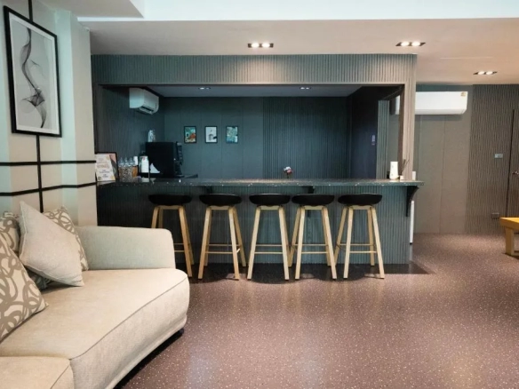 Hotel bedroom with soft tones and calm atmosphere