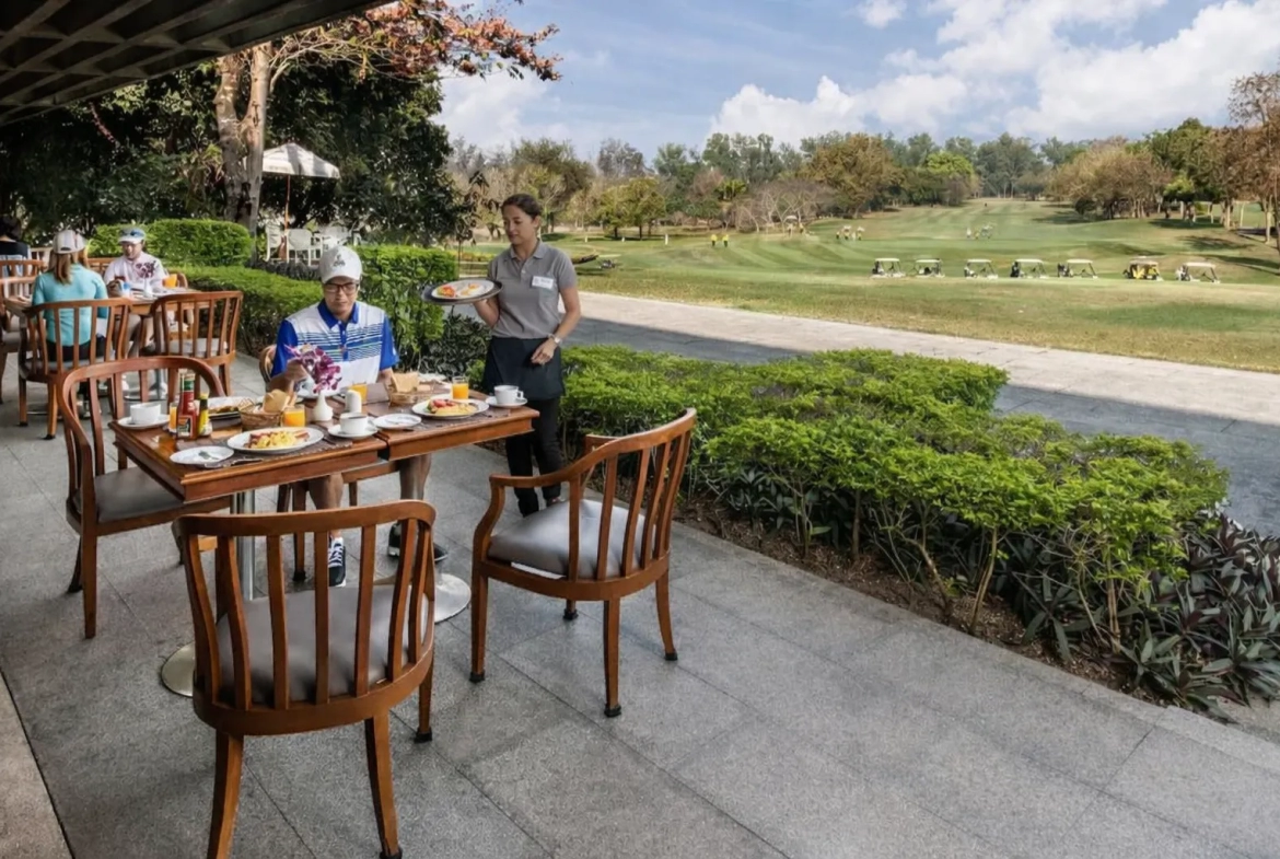 Outdoor dining overlooking golf course Chiang Mai