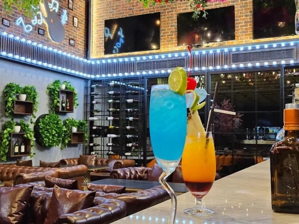 Cocktail drinks at bar counter in boutique hotel North Pattaya