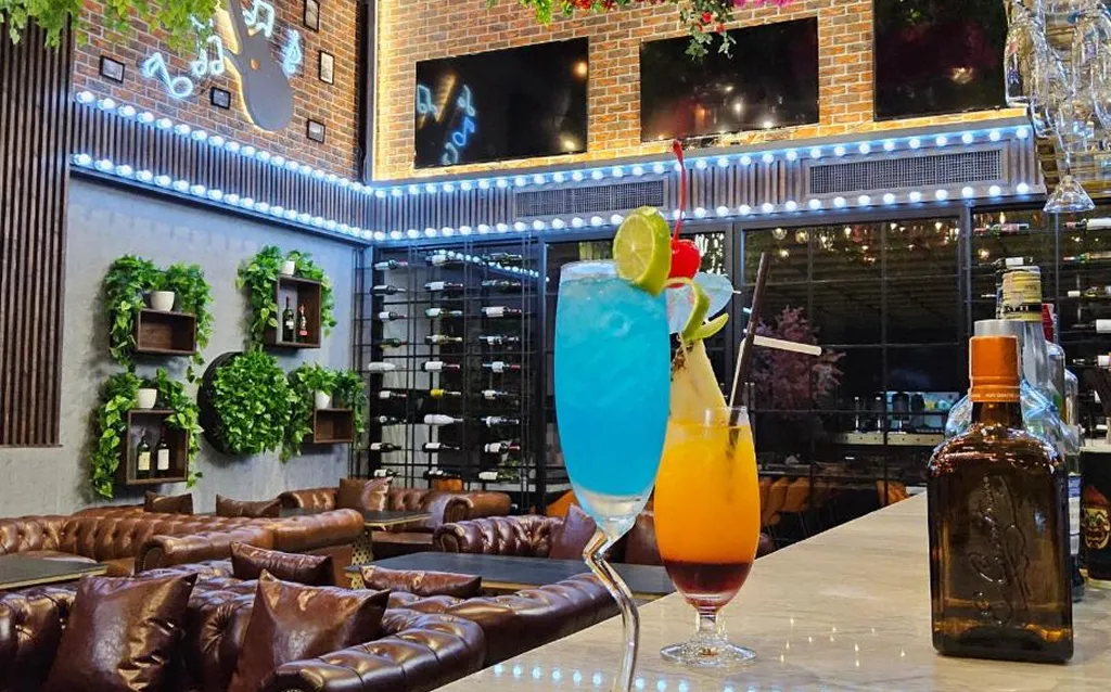 Cocktail drinks at bar counter in boutique hotel North Pattaya