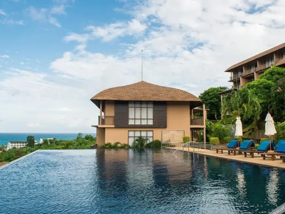 Boutique hotel exterior with pool view