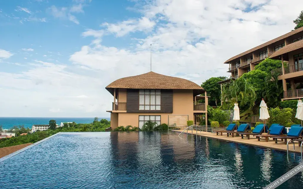 Boutique hotel exterior with pool view