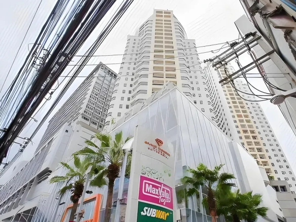 Street-level view of luxury hotel building in Pratunam