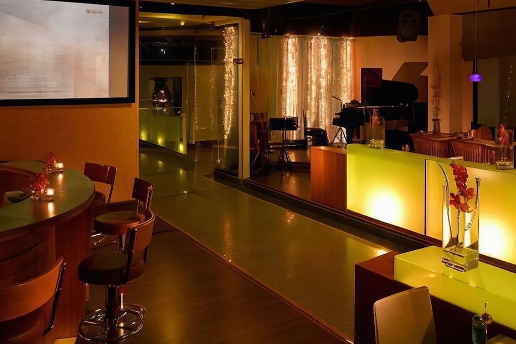 Bar and lounge area at night in Pratunam hotel