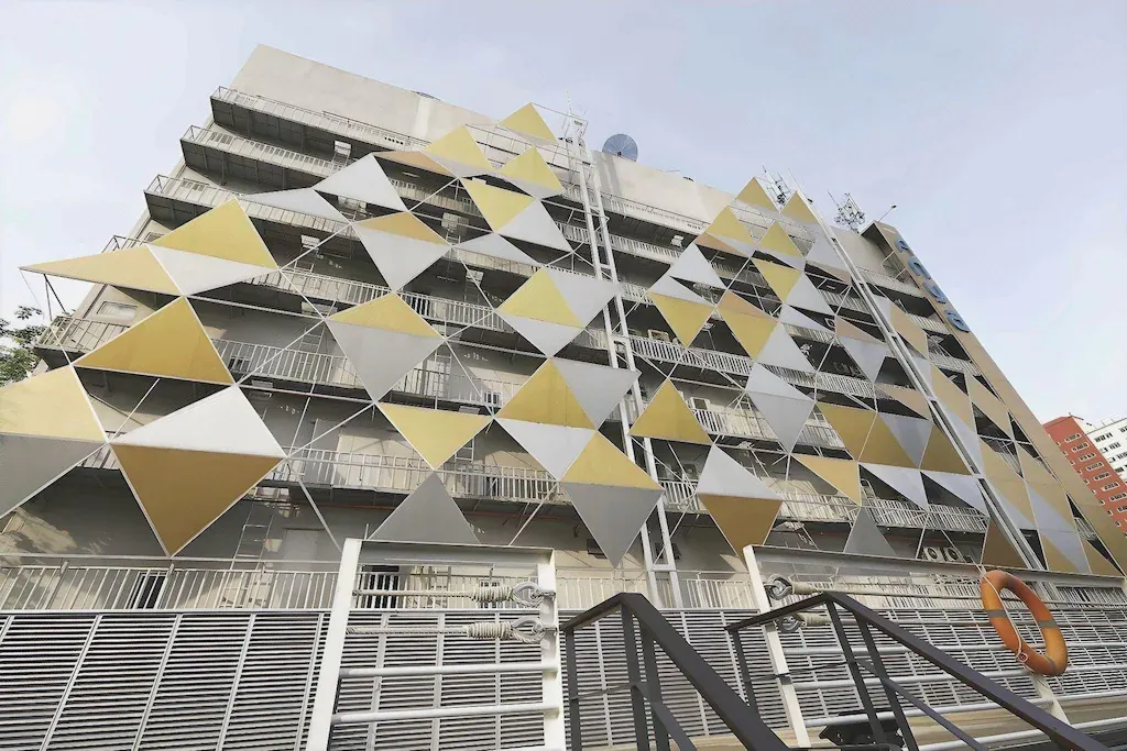 Evening exterior view of urban hotel property