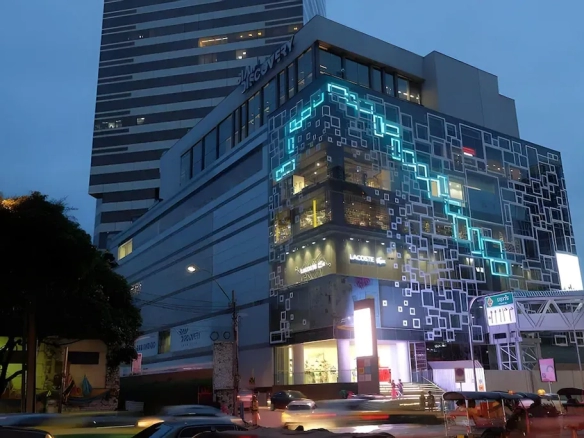 Commercial building near luxury hotel in Pratunam at night