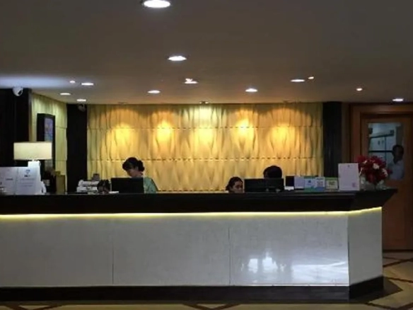 Hotel lobby interior with reception and seating area