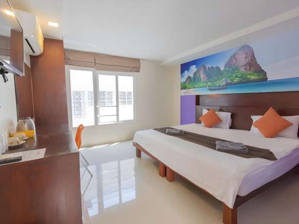 Poolside relaxation area at boutique hotel