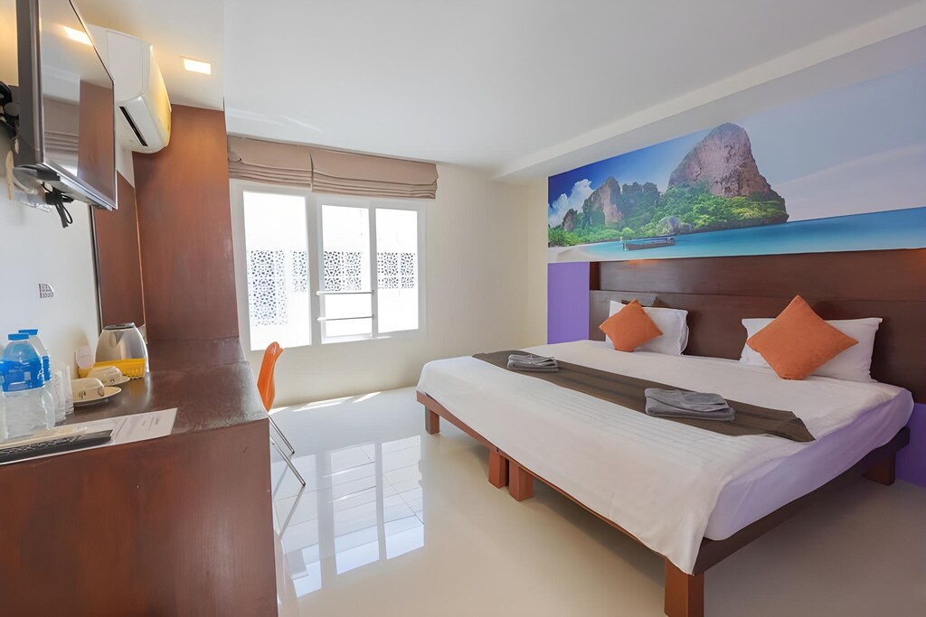 Poolside relaxation area at boutique hotel