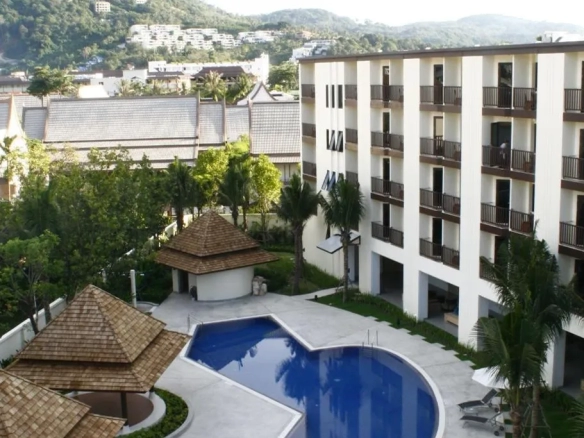 Exterior angle view of hotel and swimming pool