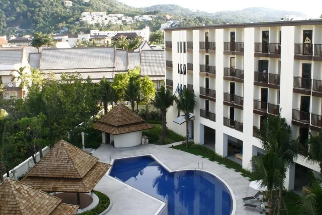 Exterior angle view of hotel and swimming pool