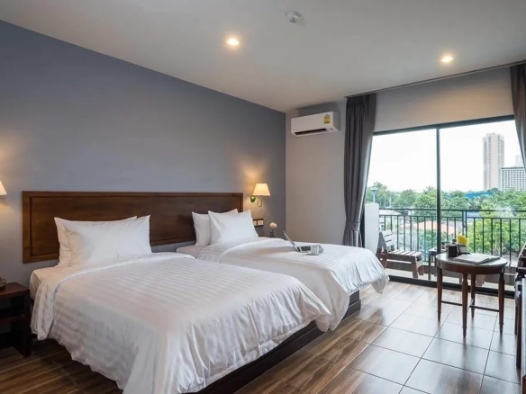 Premium suite bedroom supporting higher room rates