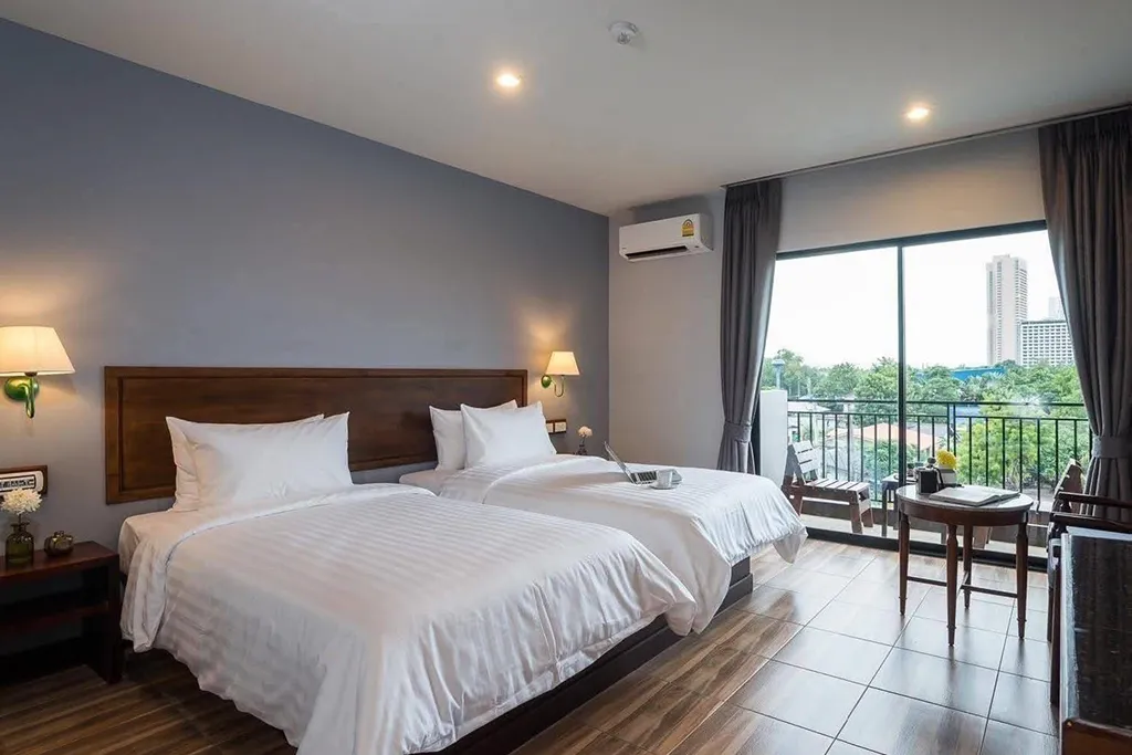 Premium suite bedroom supporting higher room rates