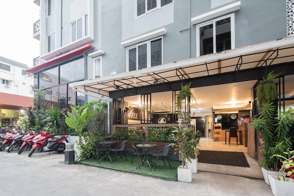 Front building view of boutique hotel for sale