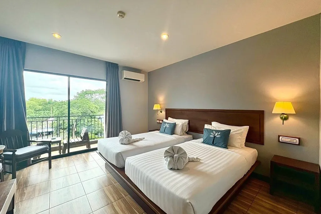 Deluxe hotel room with balcony enhancing guest experience