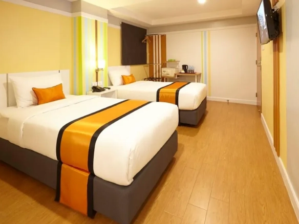 Modern guest room with king bed and city hotel design