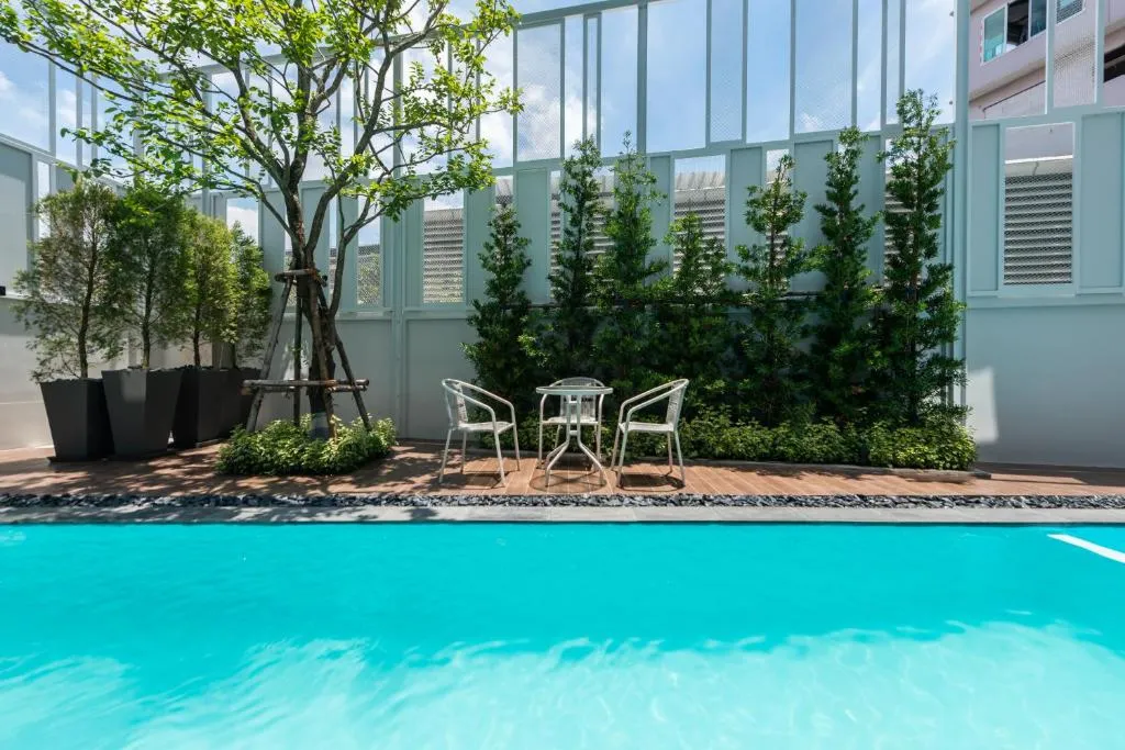 Outdoor pool area within hotel premises in Bangkok Noi Bangkok