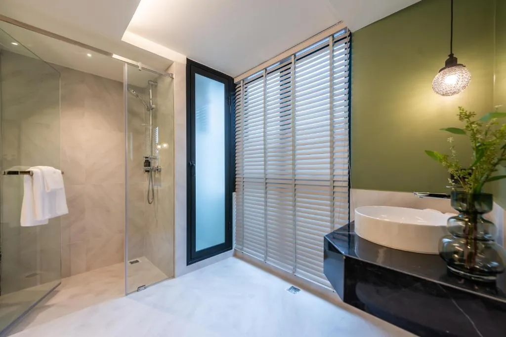 Bathroom interior showing functional space of hotel for sale in Bangkok Noi Bangkok