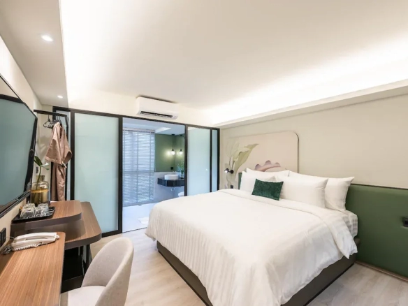 Guest room interior with work area of hotel for sale in Bangkok Noi Bangkok