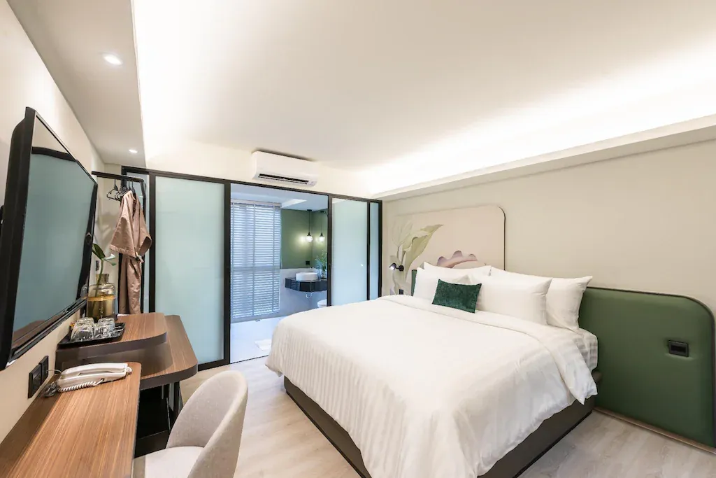 Guest room interior with work area of hotel for sale in Bangkok Noi Bangkok