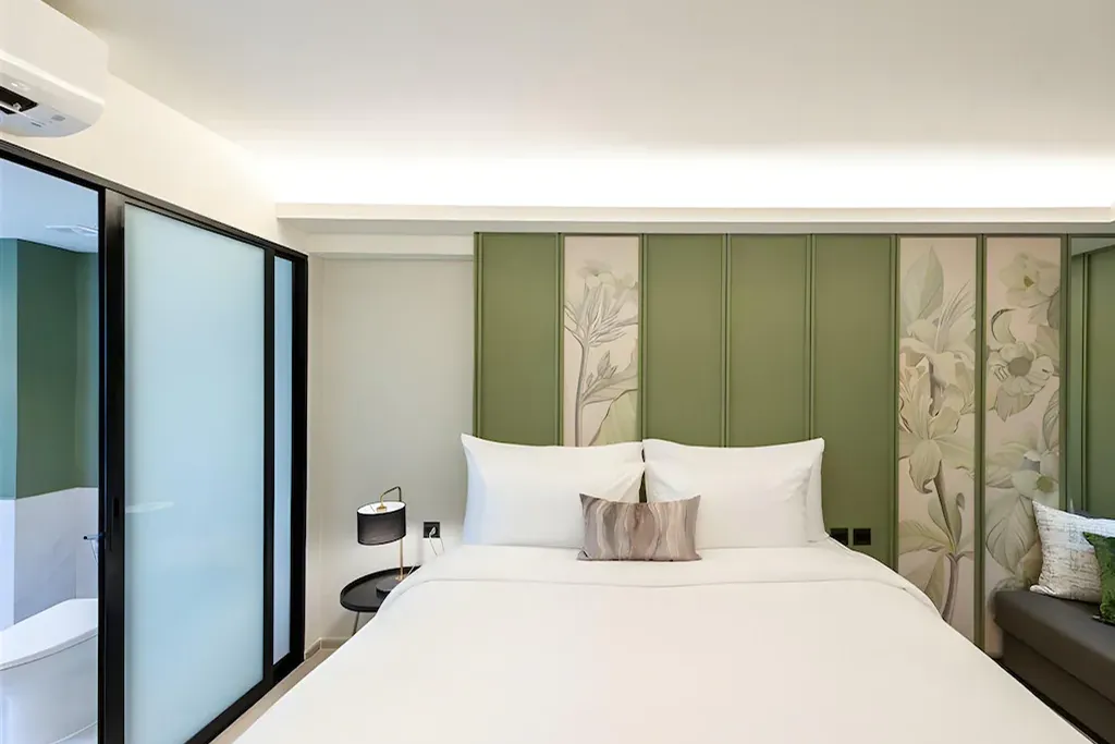 Guest room interior showing furnishing and layout of hotel for sale in Bangkok Noi Bangkok