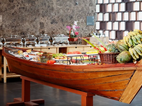 Luxury resort buffet breakfast with fresh fruits and Thai-style presentation