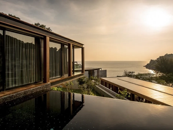 Seaside villa with private pool at sunset in Phuket