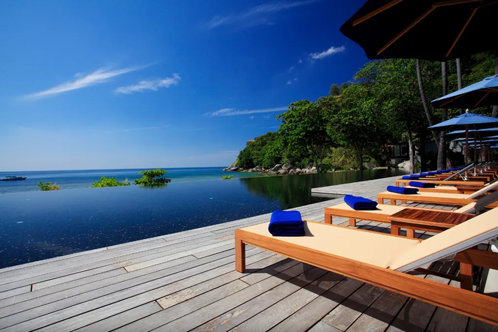 Seaside pool deck at luxury villa resort in Phuket