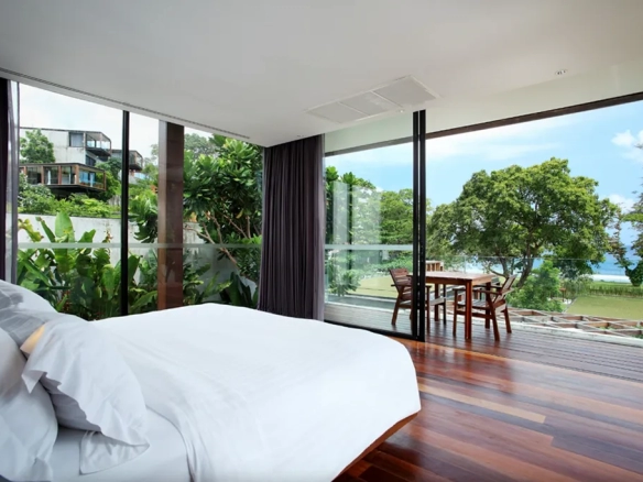 Villa bedroom with balcony and sea view in Phuket