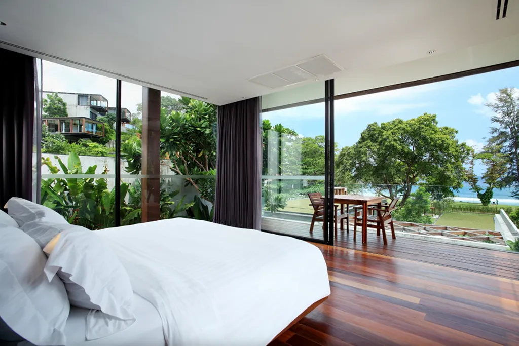 Villa bedroom with balcony and sea view in Phuket