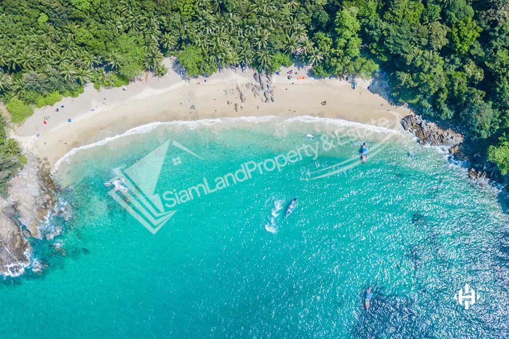 Banana Beach Cherng Talay stunning aerial top-down view showcasing the crystal clear turquoise bay and white sand crescent