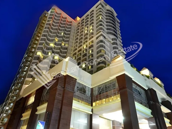 Grand City Hotel Resort majestic building exterior view at night